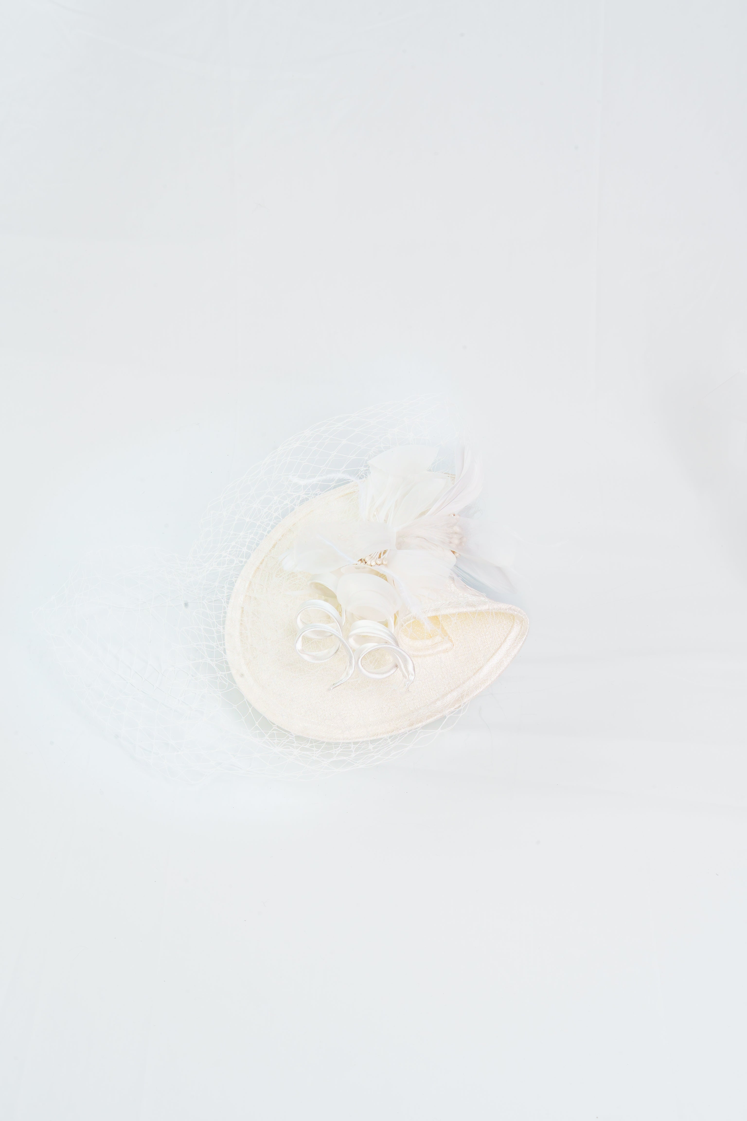 Floral Fascinator with Feather and Veil