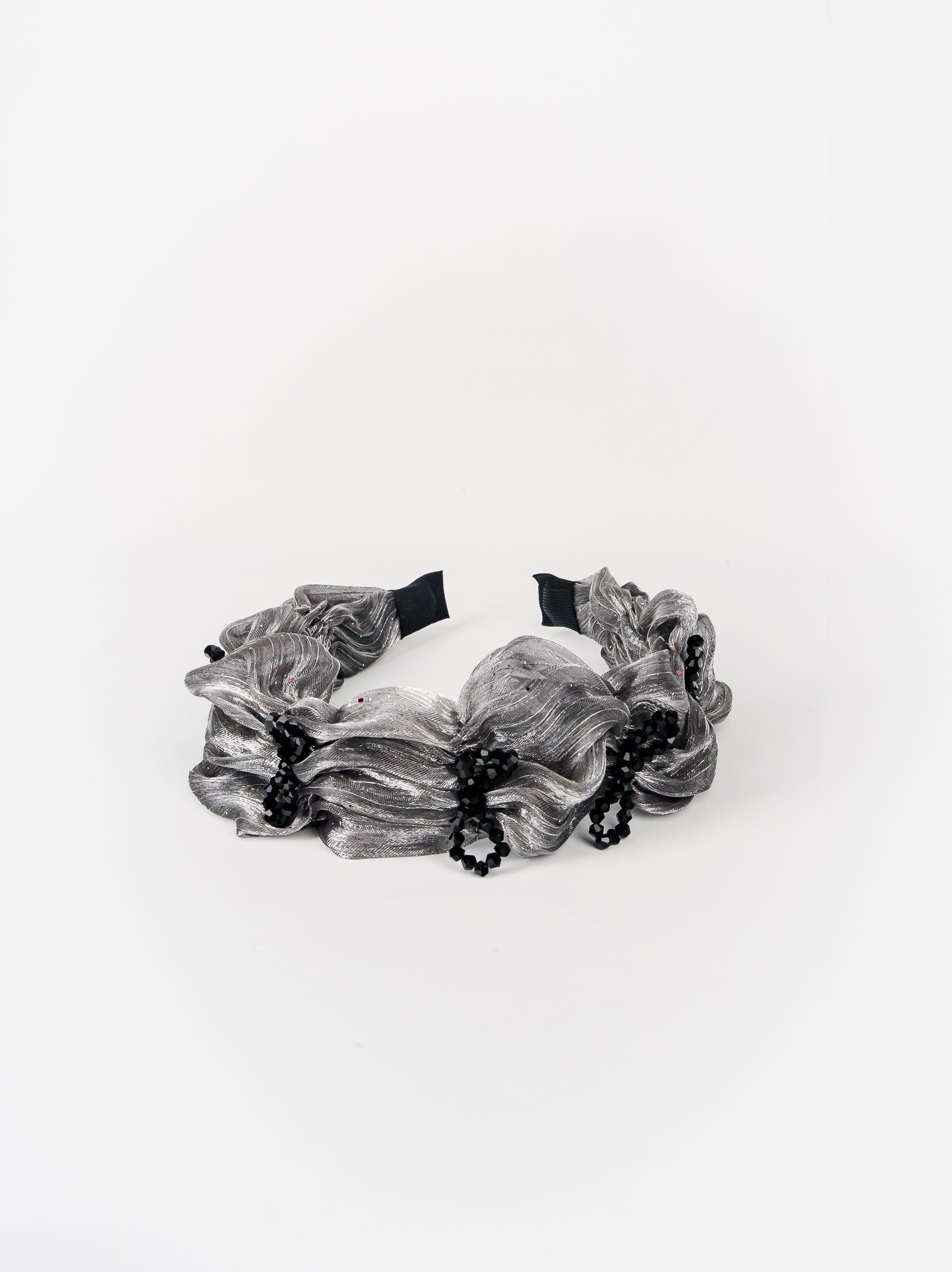 Wavy Metallic Organza Headband with Black Rosettes