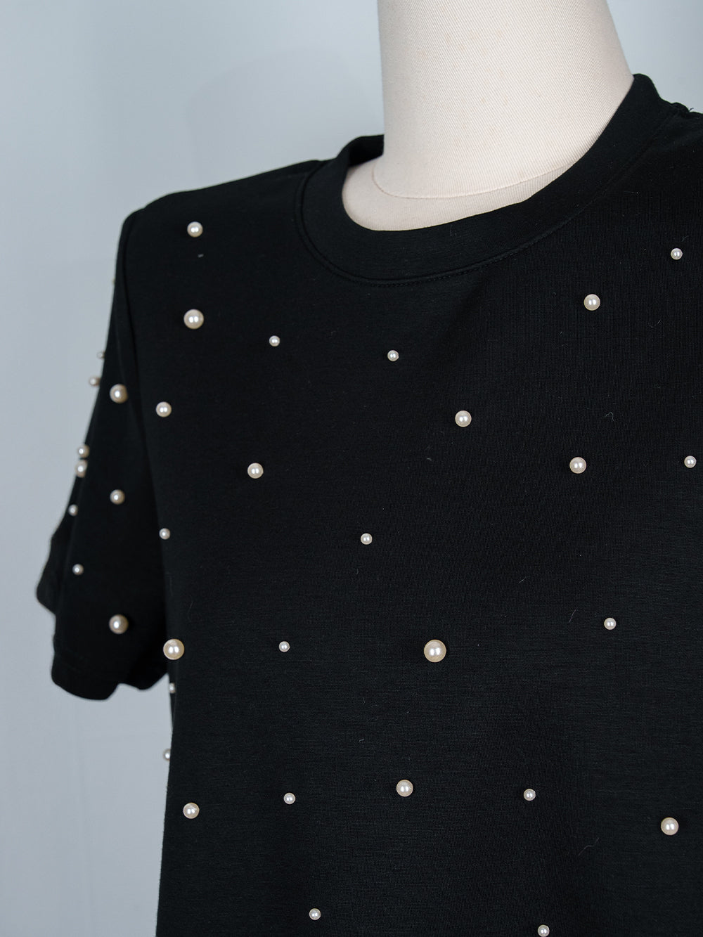 Pearl Ruffle Hem Tee