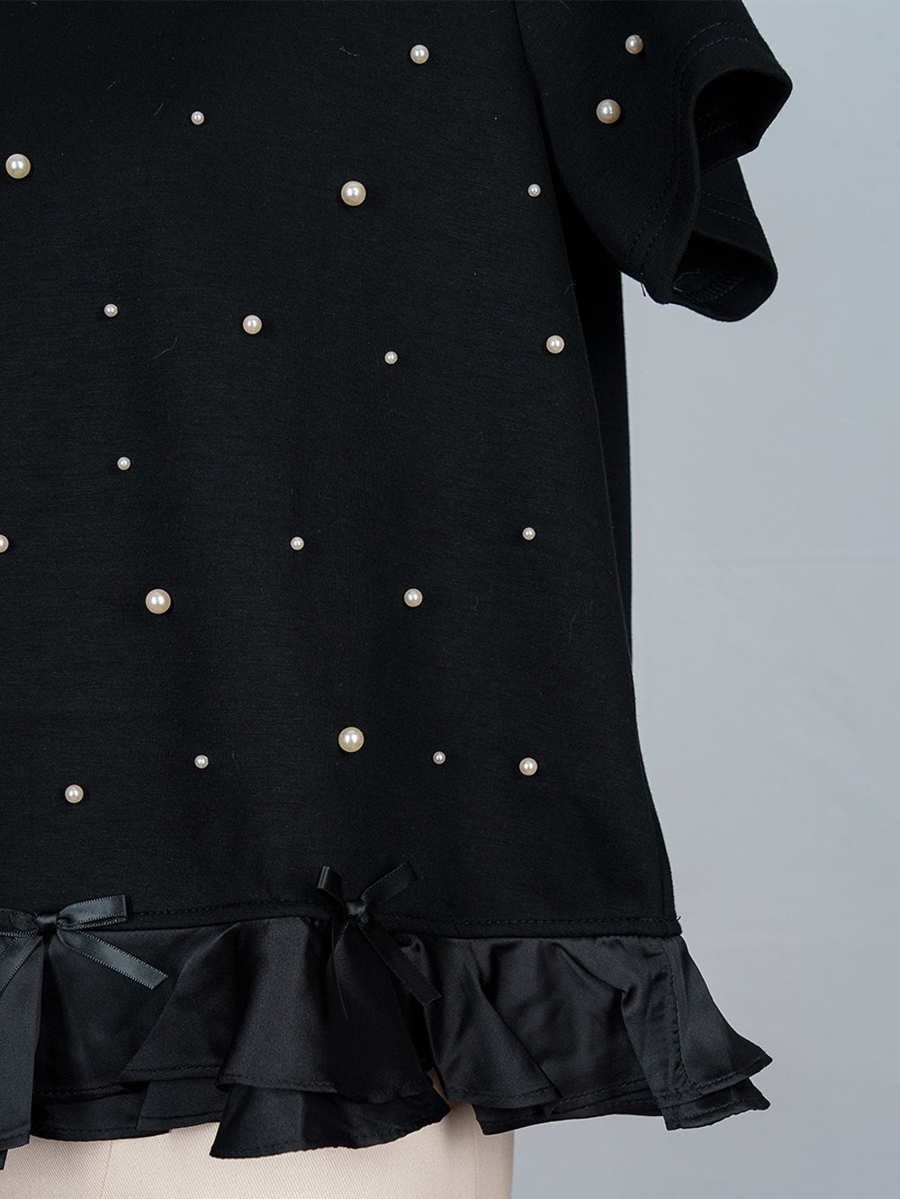 Pearl Ruffle Hem Tee